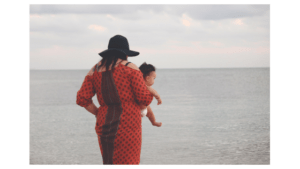 woman holding baby graphic