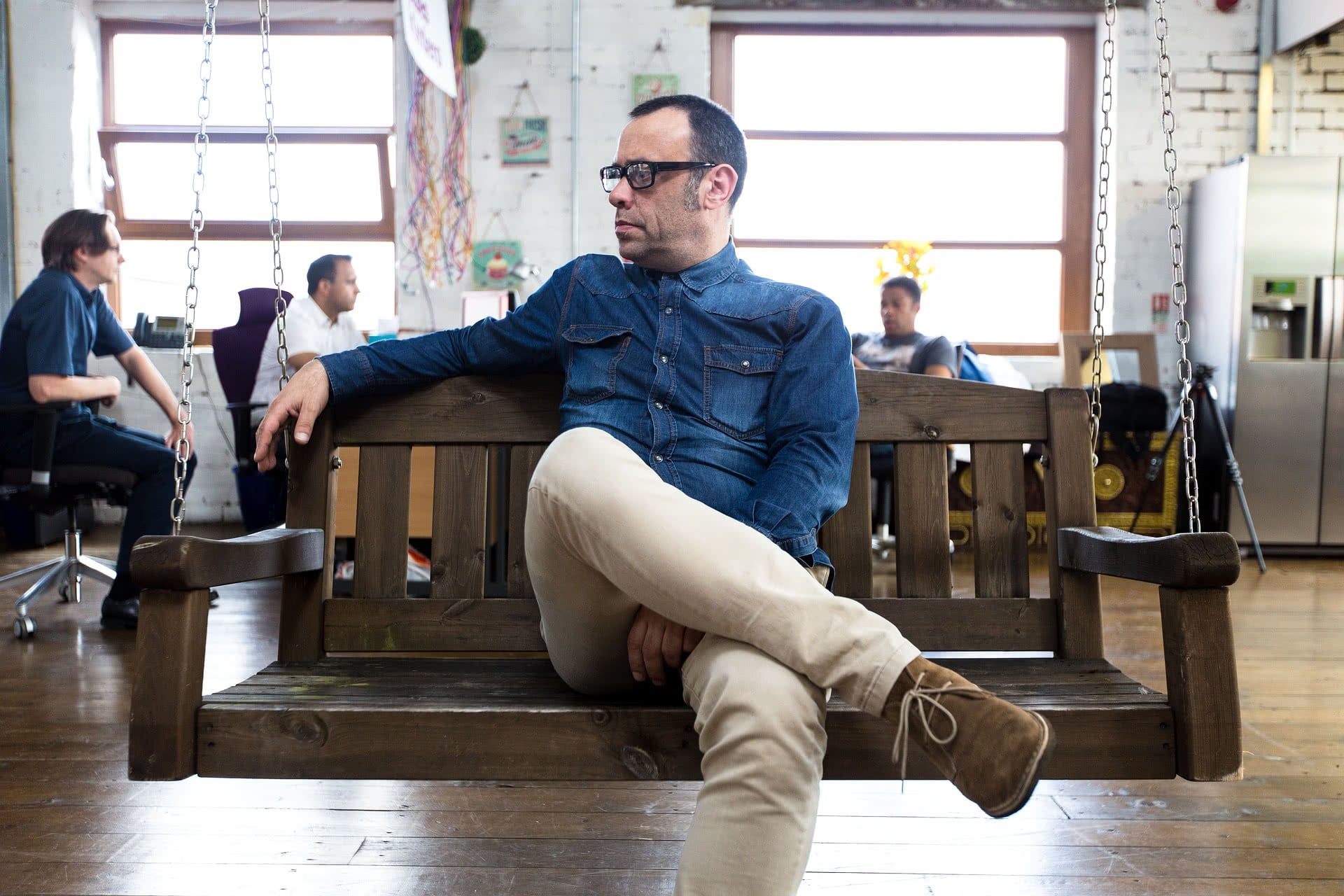 relaxed man thinking and contemplating on a bench