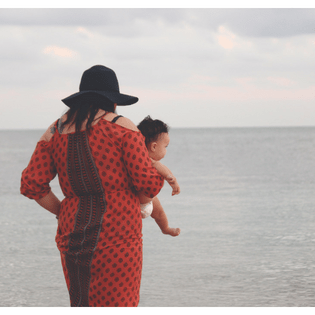 woman holding baby graphic